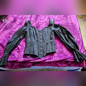 Corset Story black shoulder cut top